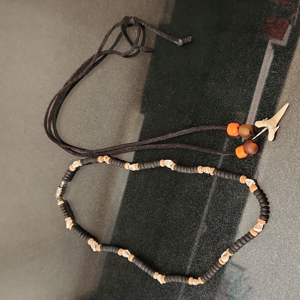 Puka shell style necklace and shark tooth necklace